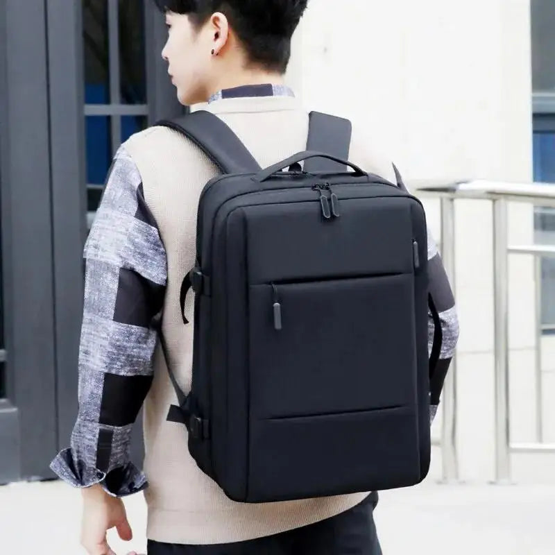 Mochila de viagem expansível masculina, feita em oxford à prova d'água, com compartimento para laptop e design elegante e funcional.