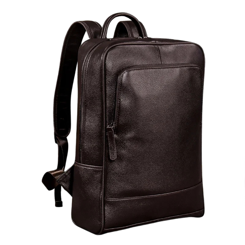 Mochila vintage de couro genuíno masculina, com compartimento para laptop 15.6", estilo elegante e funcional para negócios e viagens.

